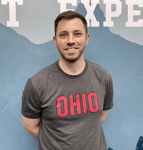 Man in Ohio shirt at IT Expeditions.